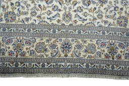 Full view of New Kashan rug from Iran / Persia, 357 × 242 cm in Beige tones