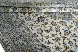 Close-up detail of 2000s Kashan rug from Iran / Persia showing Wool weave