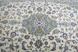 Central medallion detail of 2000s Kashan rug from Iran / Persia