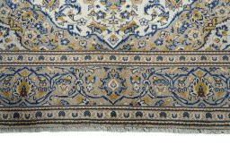Full view of 2000s Kashan rug from Iran / Persia, 280 × 203 cm in Beige tones