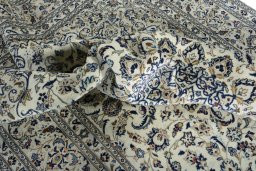 Surface texture of New Kashan rug with natural Wool and intricate pattern