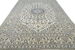 Surface texture of New Kashan rug with natural Wool and intricate pattern