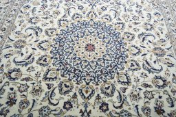 Central medallion detail of New Kashan rug from Iran / Persia