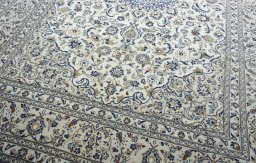 Close-up detail of New Kashan rug from Iran / Persia showing Wool weave