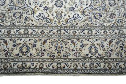 Full view of New Kashan rug from Iran / Persia, 370 × 239 cm in Beige tones