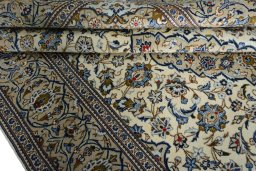 Close-up detail of New Kashan rug from Iran / Persia showing Wool weave