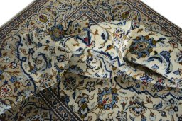 Surface texture of New Kashan rug with natural Wool and intricate pattern