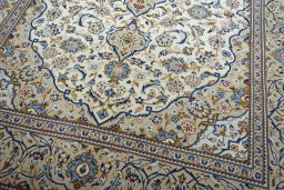 Close-up detail of New Kashan rug from Iran / Persia showing Wool weave