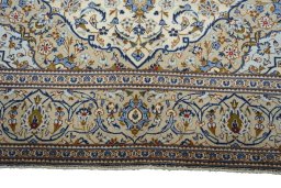 Full view of New Kashan rug from Iran / Persia, 291 × 200 cm in Beige tones