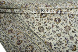 Close-up detail of New Kashan rug from Iran / Persia showing Wool weave