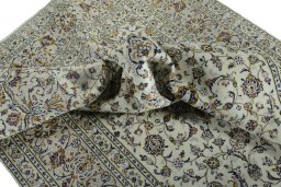 Surface texture of New Kashan rug with natural Wool and intricate pattern