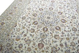 Backside of handmade New Kashan rug showing knot structure and weave density
