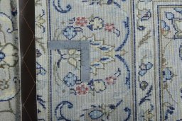 Central medallion detail of 2000s Kashan rug from Iran / Persia