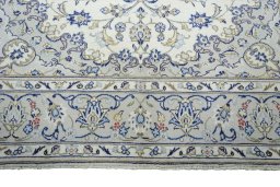 Full view of 2000s Kashan rug from Iran / Persia, 298 × 195 cm in Beige tones