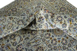Surface texture of 2000s Kashan rug with natural Wool and intricate pattern