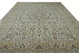 Surface texture of 2000s Kashan rug with natural Wool and intricate pattern