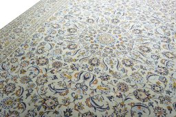 Backside of handmade 2000s Kashan rug showing knot structure and weave density