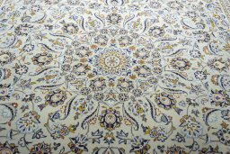 Central medallion detail of 2000s Kashan rug from Iran / Persia