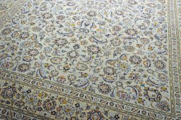 Close-up detail of 2000s Kashan rug from Iran / Persia showing Wool weave
