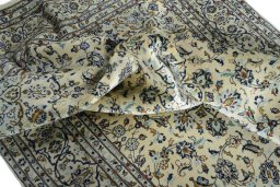 Surface texture of New Kashan rug with natural Wool and intricate pattern