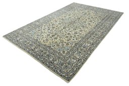 Corner detail of New Kashan rug showing border pattern and Wool pile