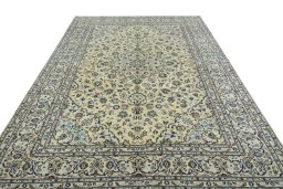 Surface texture of New Kashan rug with natural Wool and intricate pattern