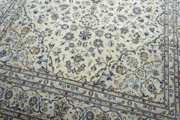 Close-up detail of New Kashan rug from Iran / Persia showing Wool weave