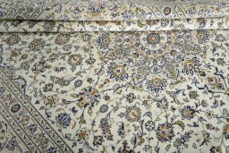 Close-up detail of New Kashan rug from Iran / Persia showing Wool weave