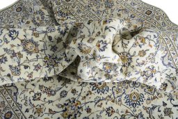 Surface texture of New Kashan rug with natural Wool and intricate pattern