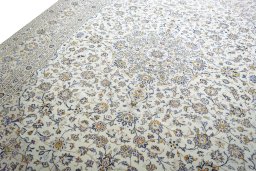 Backside of handmade New Kashan rug showing knot structure and weave density