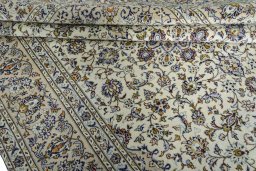 Close-up detail of 2000s Kashan rug from Iran / Persia showing Wool weave