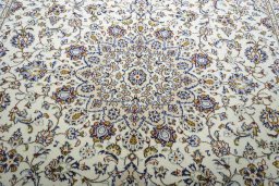 Central medallion detail of 2000s Kashan rug from Iran / Persia