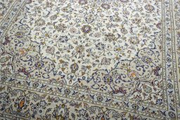 Close-up detail of 2000s Kashan rug from Iran / Persia showing Wool weave
