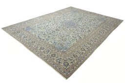Corner detail of 2000s Kashan rug showing border pattern and Wool pile