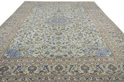 Surface texture of 2000s Kashan rug with natural Wool and intricate pattern