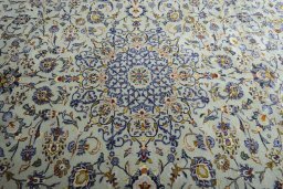 Central medallion detail of 2000s Kashan rug from Iran / Persia