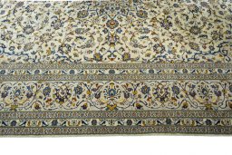 Corner detail of New Kashan rug showing border pattern and Wool pile