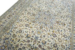 Backside of handmade New Kashan rug showing knot structure and weave density