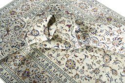 Surface texture of New Kashan rug with natural Wool and intricate pattern