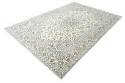 Corner detail of New Kashan rug showing border pattern and Wool pile