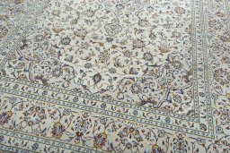 Close-up detail of New Kashan rug from Iran / Persia showing Wool weave