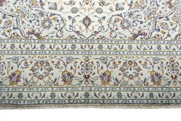 Full view of New Kashan rug from Iran / Persia, 354 × 240 cm in Beige tones