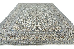 Surface texture of 2000s Kashan rug with natural Wool and intricate pattern