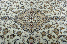 Central medallion detail of 2000s Kashan rug from Iran / Persia