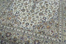 Close-up detail of 2000s Kashan rug from Iran / Persia showing Wool weave