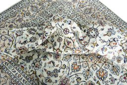 Surface texture of 2000s Kashan rug with natural Wool and intricate pattern