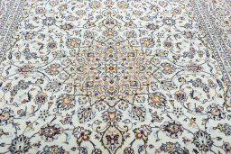 Central medallion detail of 2000s Kashan rug from Iran / Persia