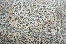 Close-up detail of 2000s Kashan rug from Iran / Persia showing Wool weave