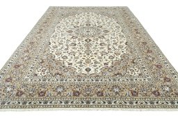 Surface texture of 2000s Kashan rug with natural Wool and intricate pattern