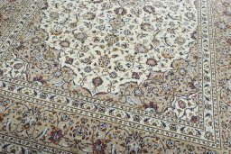 Close-up detail of 2000s Kashan rug from Iran / Persia showing Wool weave